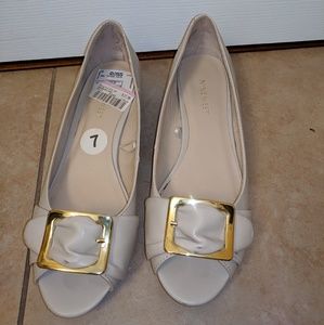 Small wedge shoes by nine west. Size 7.